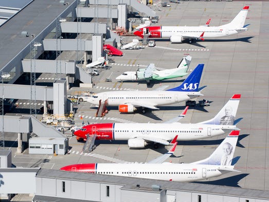 Airplanes line the older domestic terminal at Oslo