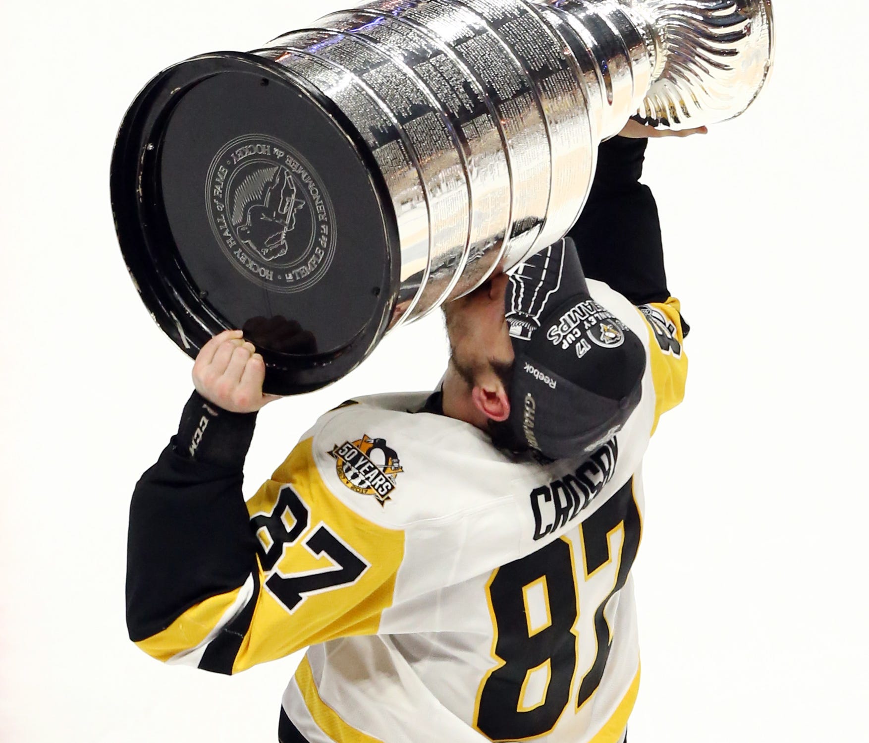 Pittsburgh Penguins center Sidney Crosby kisses the Stanley Cup after defeating the Nashville Predators in Game 6 to win the Stanley Cup.