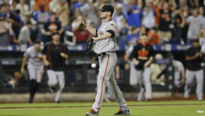 San Francisco Giants starting pitcher Chris Heston (53) celebrates with teammates after he threw a no-hitter against the New York Mets on Tuesday night.