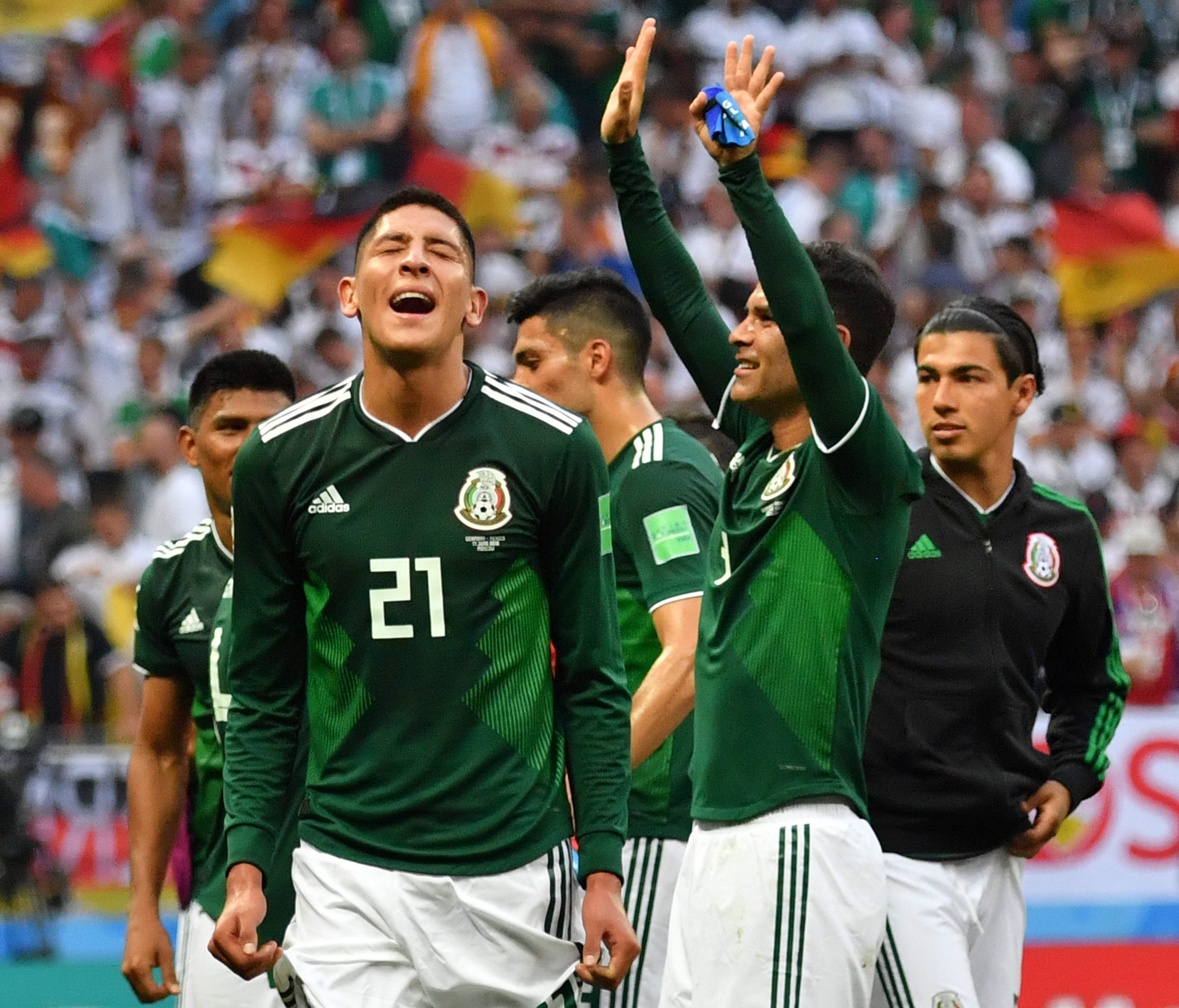 Mexico's defender Edson Alvarez (left) and teammates celebrate their 1-0 victory at the end of the 2018 World Cup Group F match against Germany at the Luzhniki Stadium in Moscow on June 17.