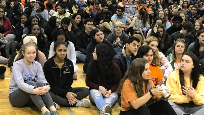 A walkout at North Farmington last month drew an estimated 900 students into the school's gym.