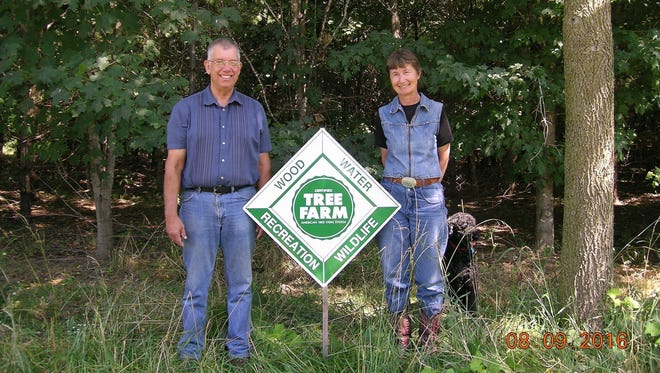 Terry Sieker and Linda Clemedtson-Sieker of Greenleaf, WI, earned an award for their tree farm.