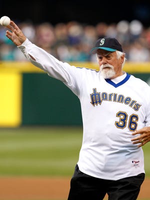Hall of Famer Gaylord Perry, shown throwing out the first pitch before a game at Safeco Field in 2012, won his 300th career game while pitching for the Mariners in 1982.
