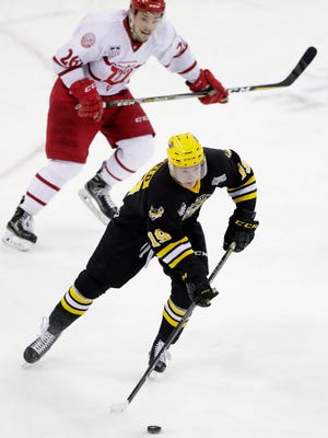Green Bay Gamblers forward Brock Caufield brings the puck up the ice against the Dubuque Fighting Saints in a Clark Cup playoff game at the Resch Center on April 17.