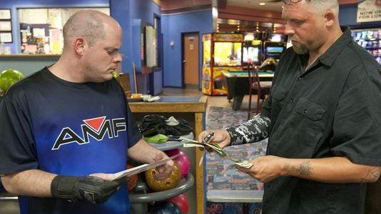 Vinnie Orobono, a developmentally disabled man from Jackson, works in bowling alleys and is an accomplished bowler. Vinnie with his bowling partner Troy Barkley, Manchester, before a match.