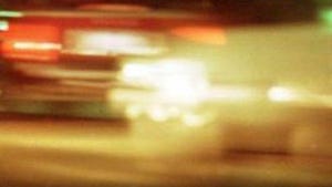 A woman who police say ran over her 9-year-old son while dropping him off at school in western Michigan has reached a plea deal in the case.