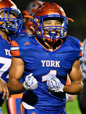York High's Dayjure Stewart reacts after scoring a touchdown in a game last season. DISPATCH FILE PHOTO.