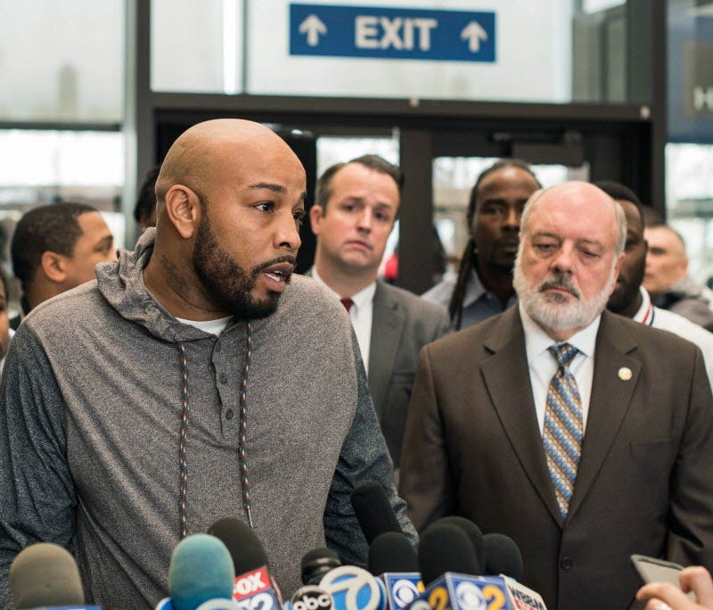 Leonard Gipson, one of 15 convicted men, talks to reporters after a judge in Chicago threw out the convictions of the men, who say a corrupt Chicago police sergeant manufactured evidence that sent them to prison, Thursday, Nov. 16, 2017, in Chicago.