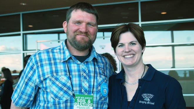 Tucker and Becky Gretebeck are Organic Valley farmers who transitioned their dairy herd to all grass-fed production a few years ago. They visited with consumers about how pleased there are with their herds health during a Grass Up event in Madison last week.