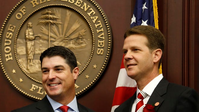Speaker of the Florida House of Representatives Steve Crisafulli and Senate President Andy Gardiner stand together during the first day of the Legislative session.