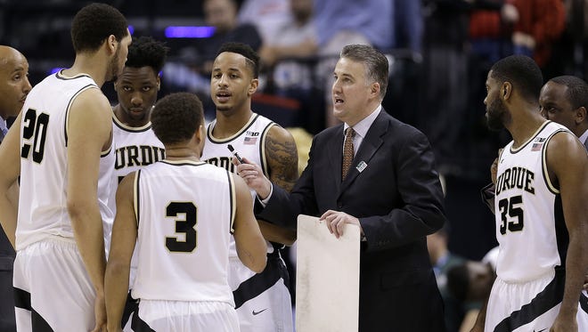 Purdue Boilermakers head coach Matt Painter talks to his players in the second half of their Big Ten Men's Basketball Tournament semifinal game Saturday, Mar 12, 2016, afternoon at Bankers Life Fieldhouse. The Purdue Boilermakers defeated the Michigan Wolverines 76-59.