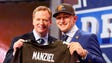 May 8, 2014: NFL Commissioner Roger Goodell presented Johnny Manziel with a Browns jersey after the Texas A&amp;M product and 2012 Heisman Trophy winner was picked 22nd overall by Cleveland during the draft's first round.