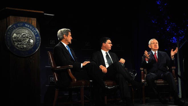 Senator Harry Reid, right, and Secretary John Kerry, left, speak during the first installment of the Harry Reid Public Engagement Lecture Series at the University of Nevada, Reno on April 3, 2018.