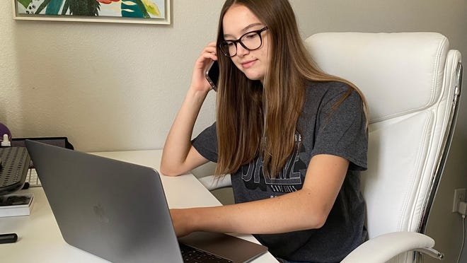 Hannah Raborn, a recent DeLand High School graduate and Florida Democratic Party Volusia fellow, participates in the "Daytona 5000," a week of phone-banking aimed at getting more Democrats to request vote-by-mail ballots. Raborn, who turns 18 in August, will be attending Florida State University in the fall.