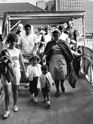 Boblo-bound passengers board a boat in Detroit on May