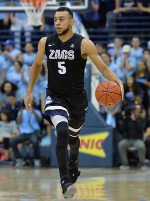 Gonzaga Bulldogs guard Nigel Williams-Goss (5) brings the ball up court during the first half against the San Diego Toreros at Jenny Craig Pavilion.