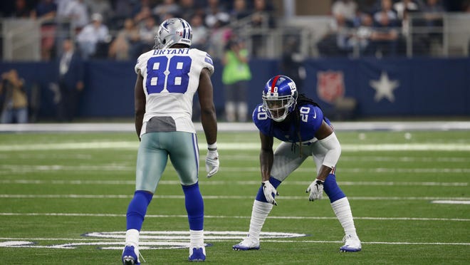 Dallas Cowboys wide receiver Dez Bryant (88) lines up against Giants defensive back Janoris Jenkins (20) during Sunday’s game in Arlington, Texas.