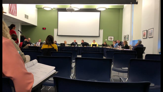 Fran Reinhard, far left, addresses the West York Area school board on the transfer of Assistant Superintendent Paula Rudy as a kindergarten teacher on Tuesday, April 10, 2018.