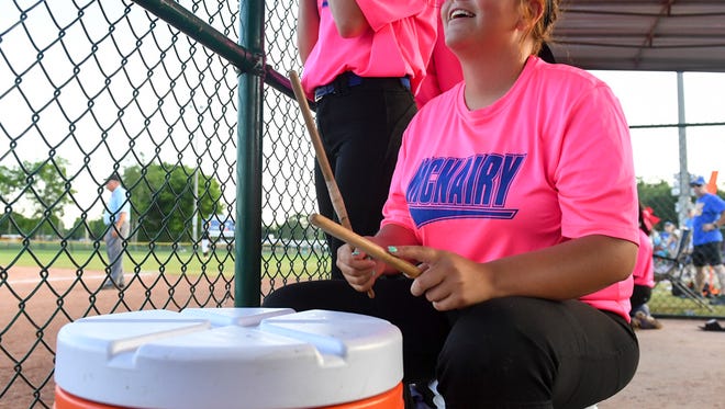 McNairy Central's Paige Nask (11) cheers on her team by playing drum sticks on a cooler during their TSSAA Class AA State Girls' Softball Championship game against CAK, Friday, May 26.