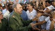 Cuban President Fidel Castro greets Latin American