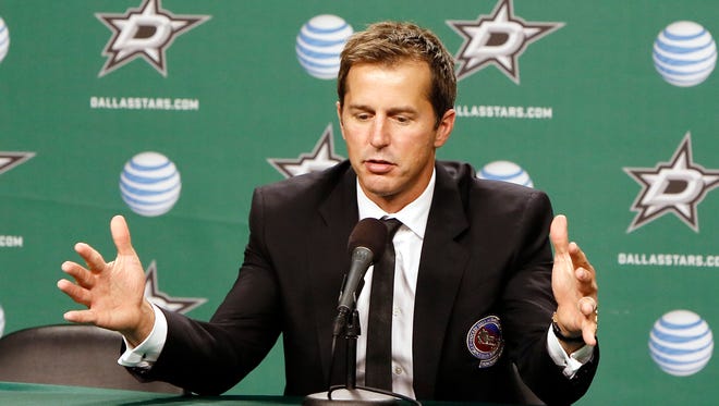 Mike Modano talks about his time in the NHL during a news conference Nov. 22, 2014, in Dallas.