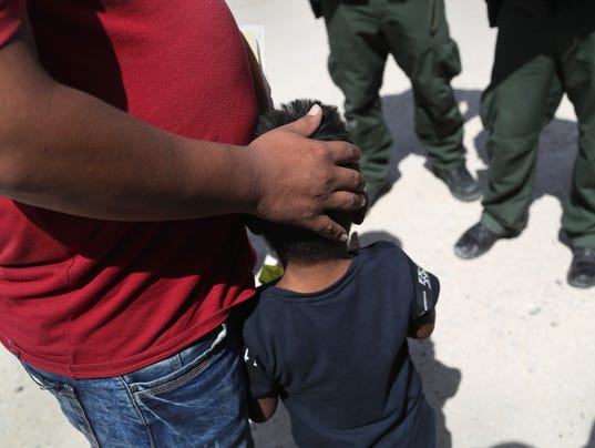 Border Patrol Agents Detain Migrants Near US-Mexico Border