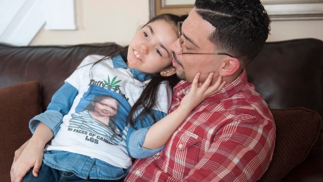 Ricardo Rivera of Camden County plans to march in Camden in the ‘Poor People’s Parade for Pot’ with his 8-year-old daughter, who has a severe form of epilepsy. Since starting a daily regimen of cannabis-infused oil, Tatyana “Tuffy” Rivera now suffers just one seizure every few weeks, instead of hundreds per day.