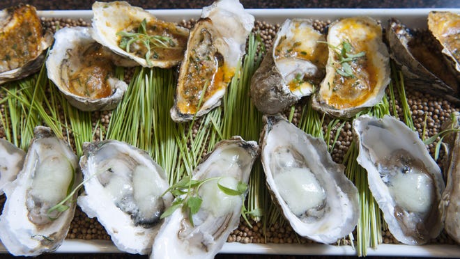Grilled oysters, such as these prepared at Rastelli Fresh Market in Voorhees, are a great choice at a shore house.