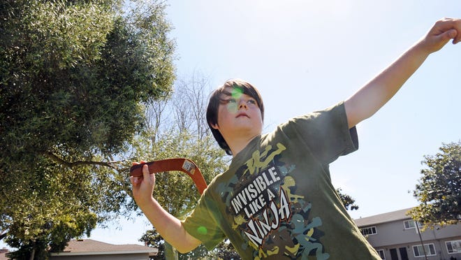 Jacob Humphries lets loose on what would be a perfect boomerang flight. He's a 4th-grade student at Mission Park Elementary School in Salinas.