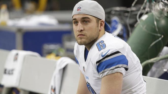 
Detroit Lions punter Sam Martin sits on the bench during the first half of an NFL football game against the Minnesota Vikings, Sunday, Dec. 29, 2013, in Minneapolis.
