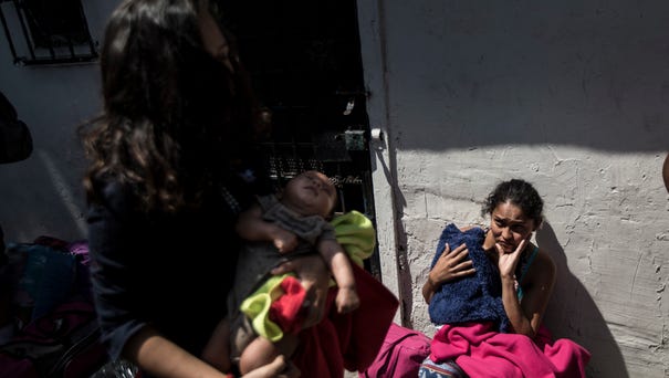 Central American mothers and children who are...