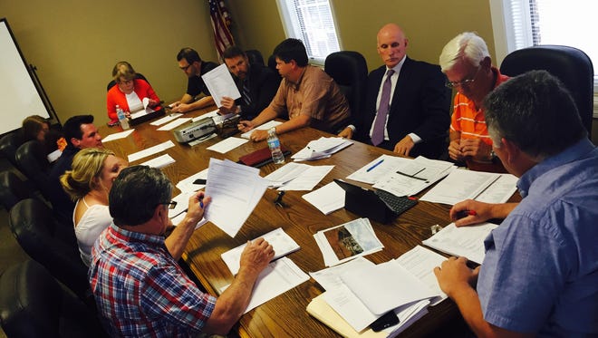 Sumner County Finance Director David Lawing (with paper) speaks to Budget Committee members on Monday, May 9 at the Administration Building in Gallatin.