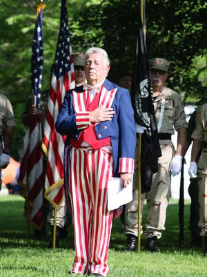 Mayor Frank Druetzler starts off the parade with a Memorial Day ceremony at Roberts Garden in Morris Plains on May 26, 2018.