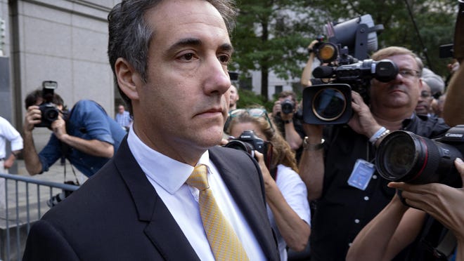 FILE - In this Aug. 21, 2018 file photo, Michael Cohen, former personal lawyer to President Donald Trump, leaves federal court after reaching a plea agreement in New York. Investigators in New York state issued a subpoena to Cohen as part of their probe into the Trump Foundation, an official with Democratic Gov. Andrew Cuomo's administration confirmed to The Associated Press on Wednesday, Aug. 22. (AP Photo/Craig Ruttle, File)