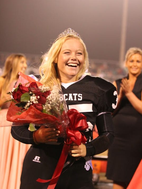 Grand Blanc football player Alicia Woollcott also queen