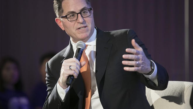 Dell Technologies founder and CEO Michael Dell speaks during an event at the Perry-Castenada Library on the University of Texas campus on Jan. 31.  Dell Technologies is laying off employees as part of an organizational restructuring to cut costs, according to a report from Bloomberg news service.
