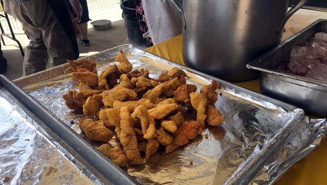 A meal is prepared from catfish freshly caught at the Baptist Retirement Community Center's "Fishing Extravaganza." April 27, 2018.