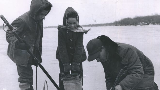 John Panawash of Waukesha takes his children John Jr. and Deanna fishing on Pewaukee Lake in this 1955 photo. The Milwaukee Ice Fishing & Winter Sport Show is this weekend at State Fair Park