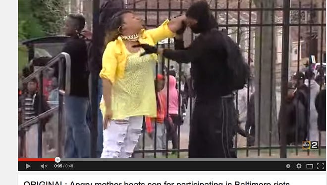 Baltimore mom stops son from participating in Baltimore riots.