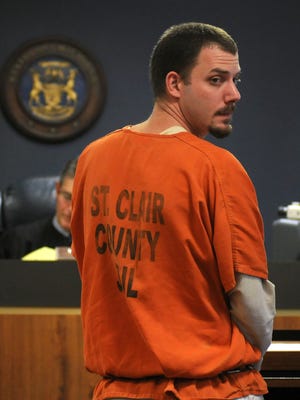 James Donald VanCallis looks back towards his family members Monday, Oct. 20 during his plea hearing for drug charges.