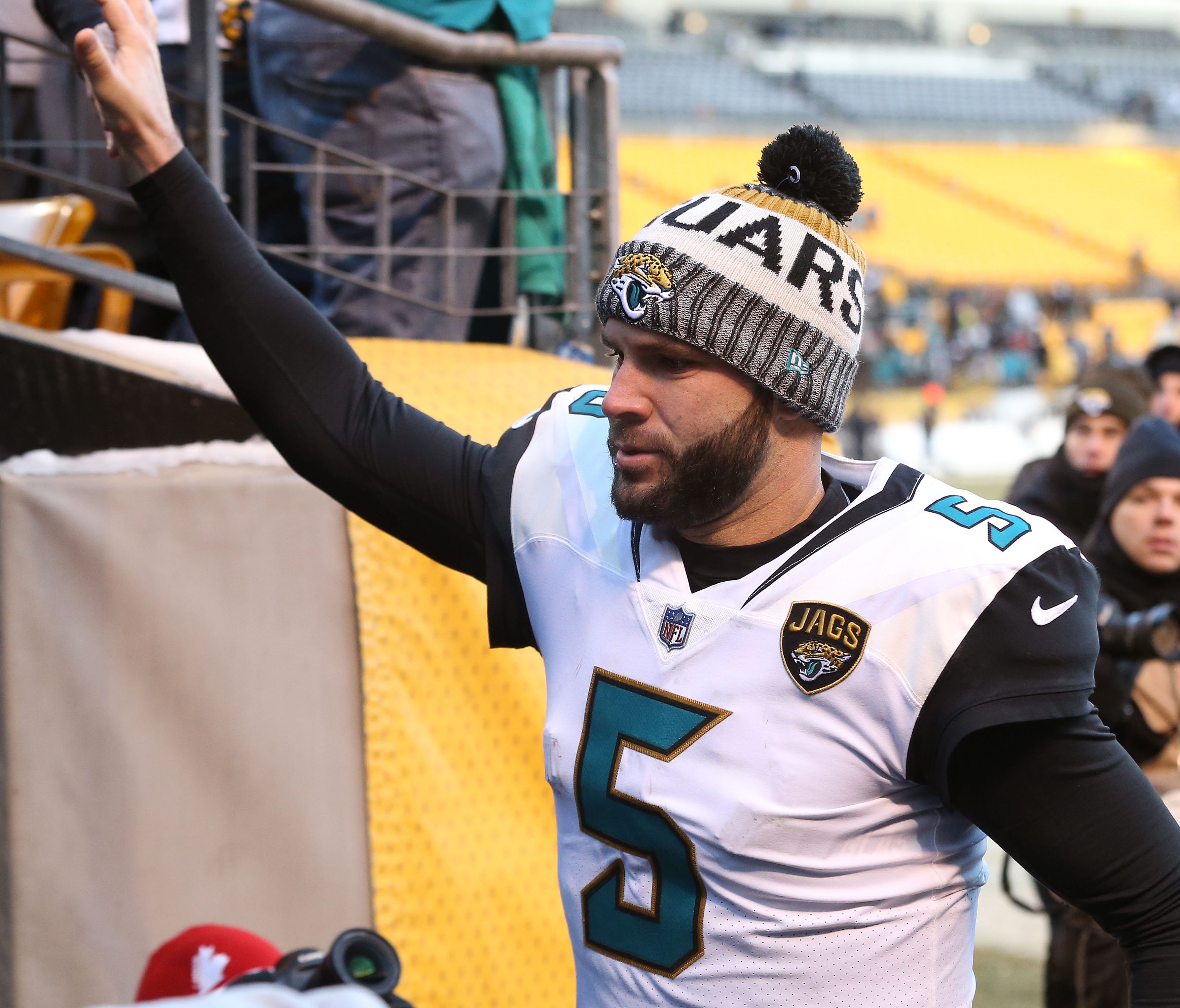 Jacksonville Jaguars quarterback Blake Bortles (5) celebrates with fans in the stands after defeating the Pittsburgh Steelers in the AFC Divisional Playoff game 45-42 at Heinz Field.