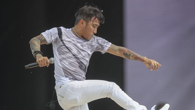 Vocalist Arnel Pineda performs with Journey on Carb Day.