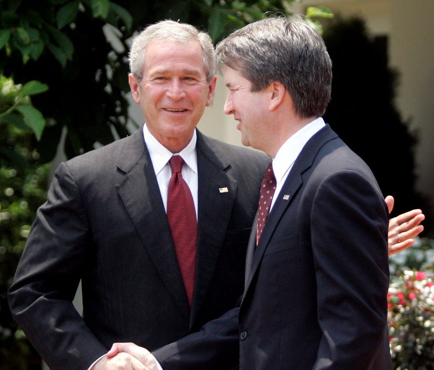 Former President George W. Bush and Judge Brett Kavanaugh at the White House on June 1, 2006.