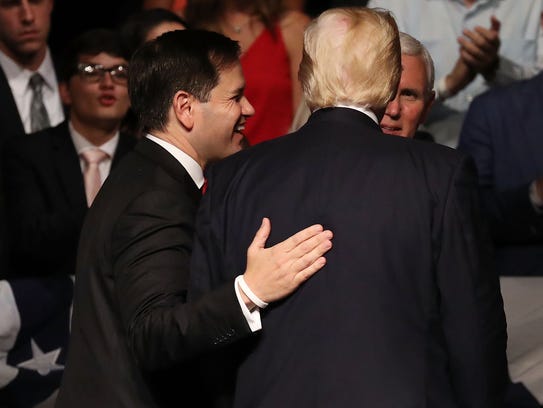 Sen. Marco Rubio, R-Fla., (R) and President Trump have