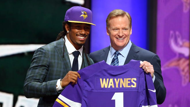 Apr 30, 2015: Trae Waynes (Michigan State) greets NFL commissioner Roger Goodell after being selected as the No. 11 overall pick to the Minnesota Vikings.