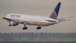 A United Airlines Boeing 767-300 lands at Amsterdam