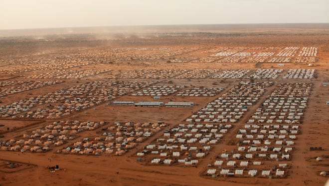 This undated photo provided by MoMA shows IFO 3, an extension to the world's largest refugee camp complex in Dadaab, Kenya. The photograph is part of the exhibit "Insecurities: Tracing Displacement and Shelter," at the museum in New York. The new exhibit invites visitors to take an entirely new look at the concept of home and design, this time through the lens of migration and global refugee emergencies, in which temporary shelters, organizers say, are being deployed on a scale akin to that after World War I.