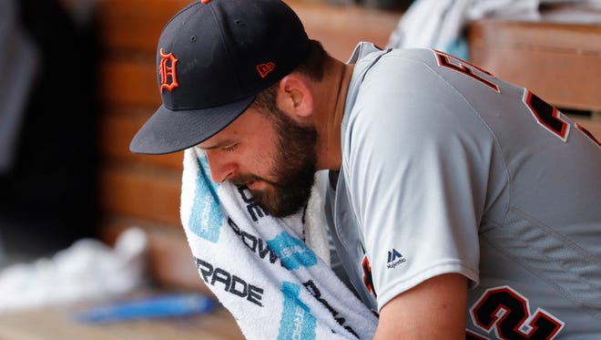 Tigers pitcher Michael Fulmer sits in the dugout after giving up the lead in the sixth inning of the Tigers' 5-3 loss to the Reds on Wednesday, June 20, 2018, in Cincinnati.