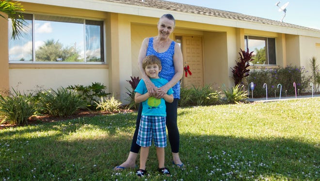 Carmel Ciccarelli is happy to get money from the state to better protect her home against hurricanes. She lives in Cape Coral with her four-year-old grandson, Daman.