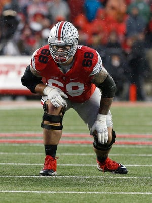 Ohio State offensive lineman Taylor Decker lines up against the Michigan State Spartans on Nov. 21, 2015, at Ohio Stadium.